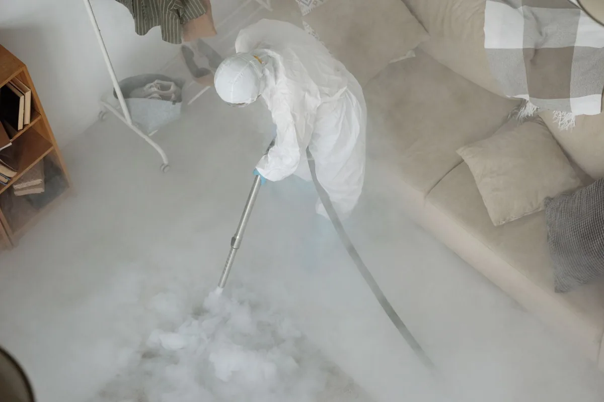 Biohazard cleanup technician in protective equipment, Hicksville, NY
